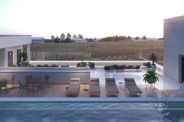 Dachterrasse mit Tischen, Stühlen und Sesseln