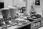 Breakfast self-serve area with a variety of foods ready for guests.