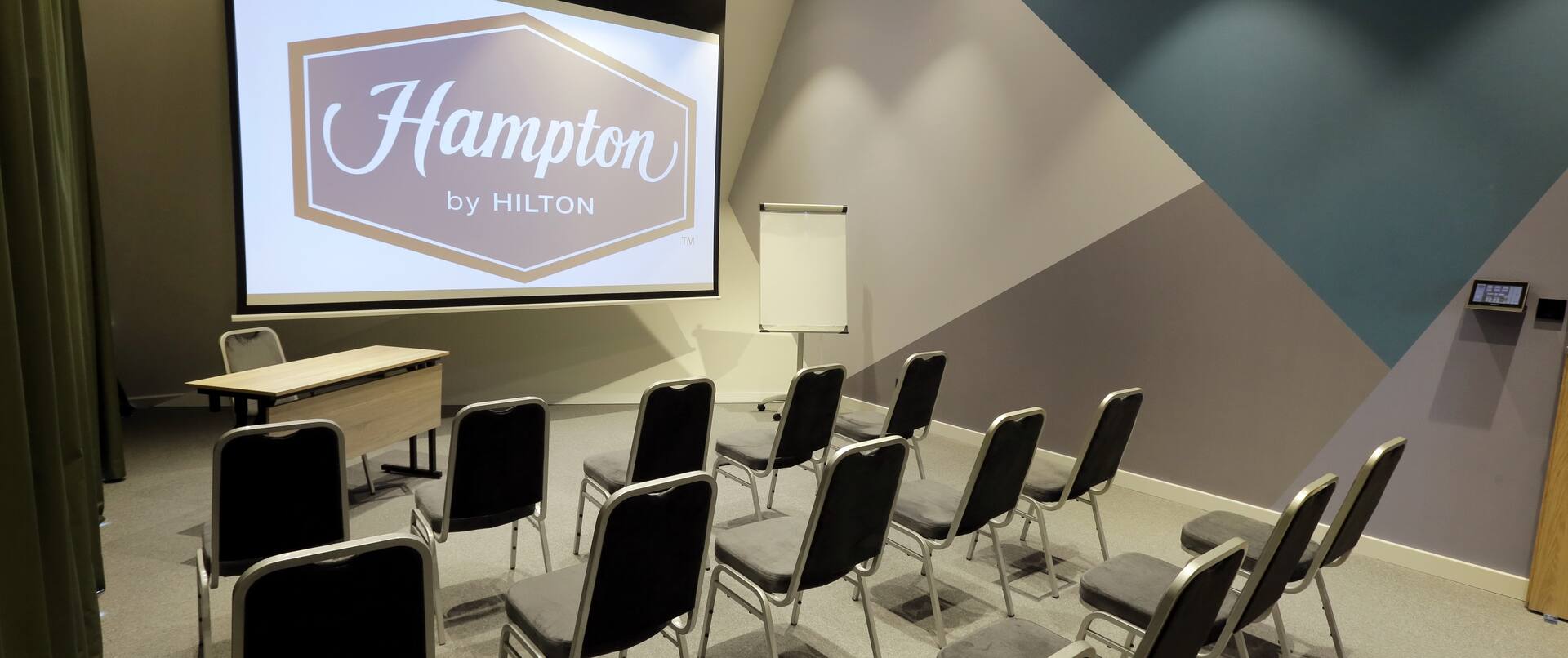 Meeting Room Setup Theater Style with Projection Screen