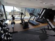 Weights Treadmills and Elliptical Machine in Fitness Center