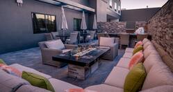Outdoor Patio Area with Sofa, Two Armchairs and Coffee Table
