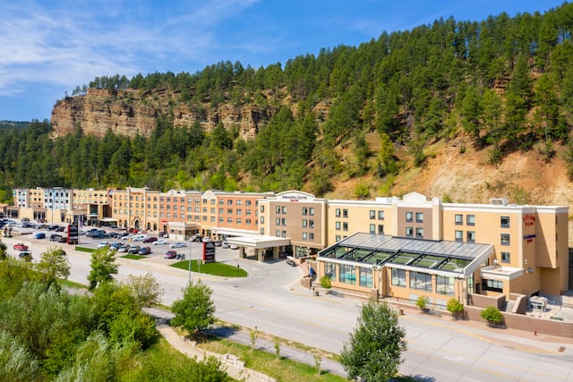 Hotel Exterior Surrounded by Trees