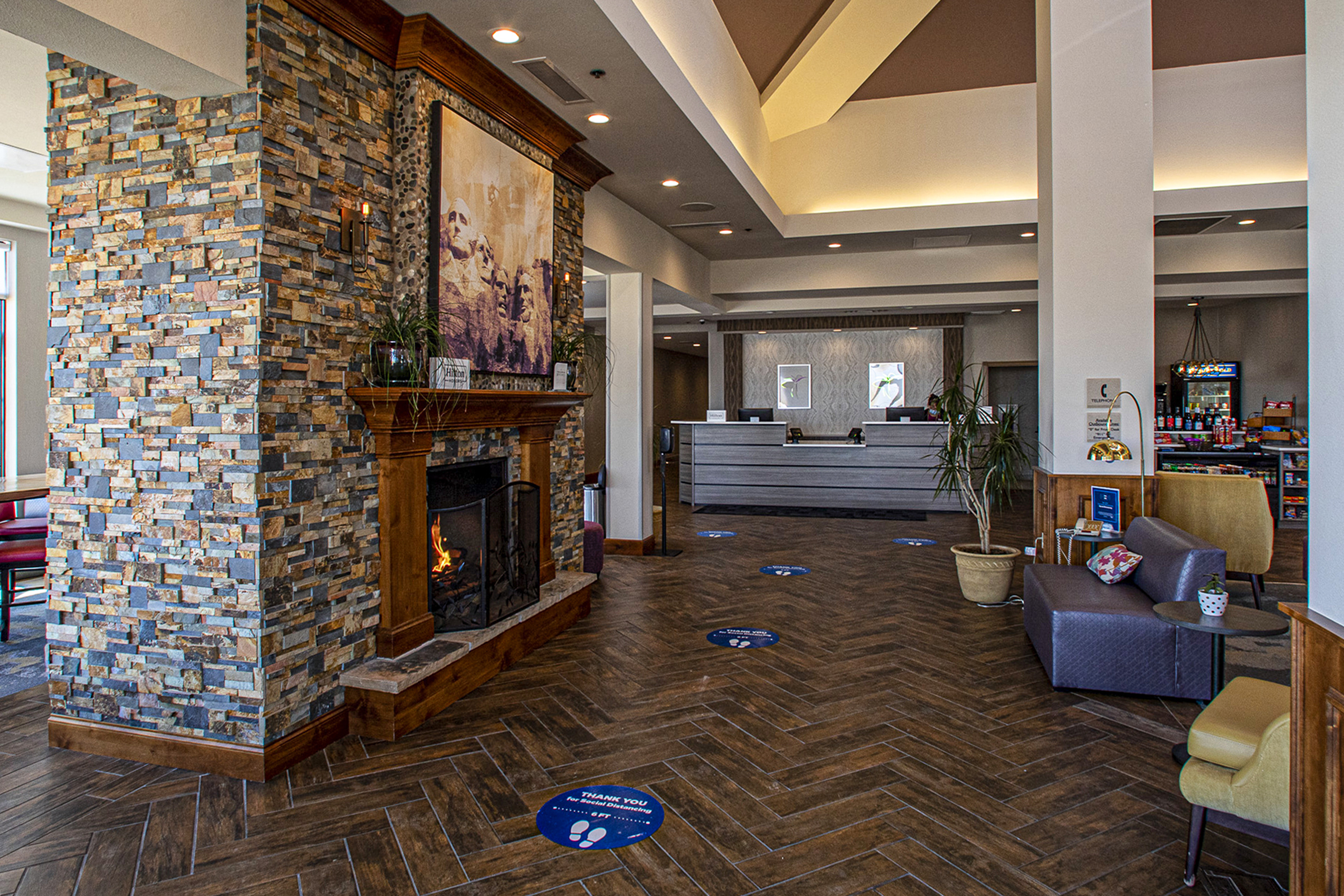 Lobby Fireplace With View of Front Desk