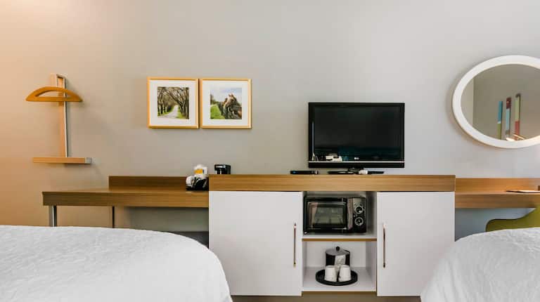 Streamline Unity with HDTV, Microwave, Desk and Storage Space in Queen Room