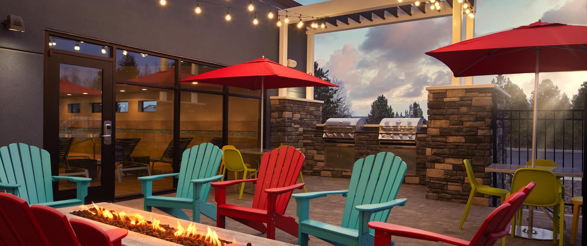 outdoor patio with firepit and grills