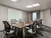Homewood Suites Raleigh-Durham AP/Research Triangle Hotel, NC - Boardroom with meeting table, chairs and presentation board