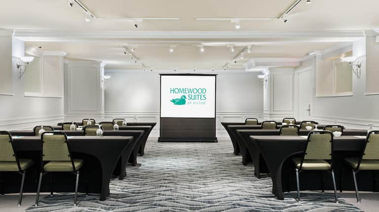 Homewood Suites Raleigh-Durham AP/Research Triangle Hotel, NC - Meeting Room Classroom Style with tables, chairs and presentation screen