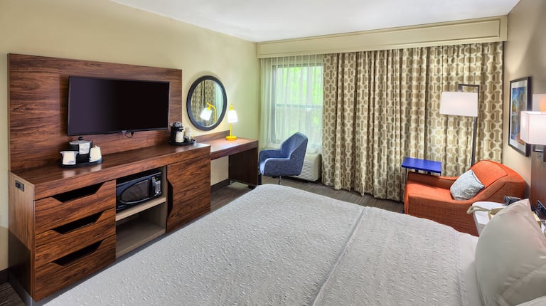 guest room, 1 king bed, lounge chair, work desk, tv