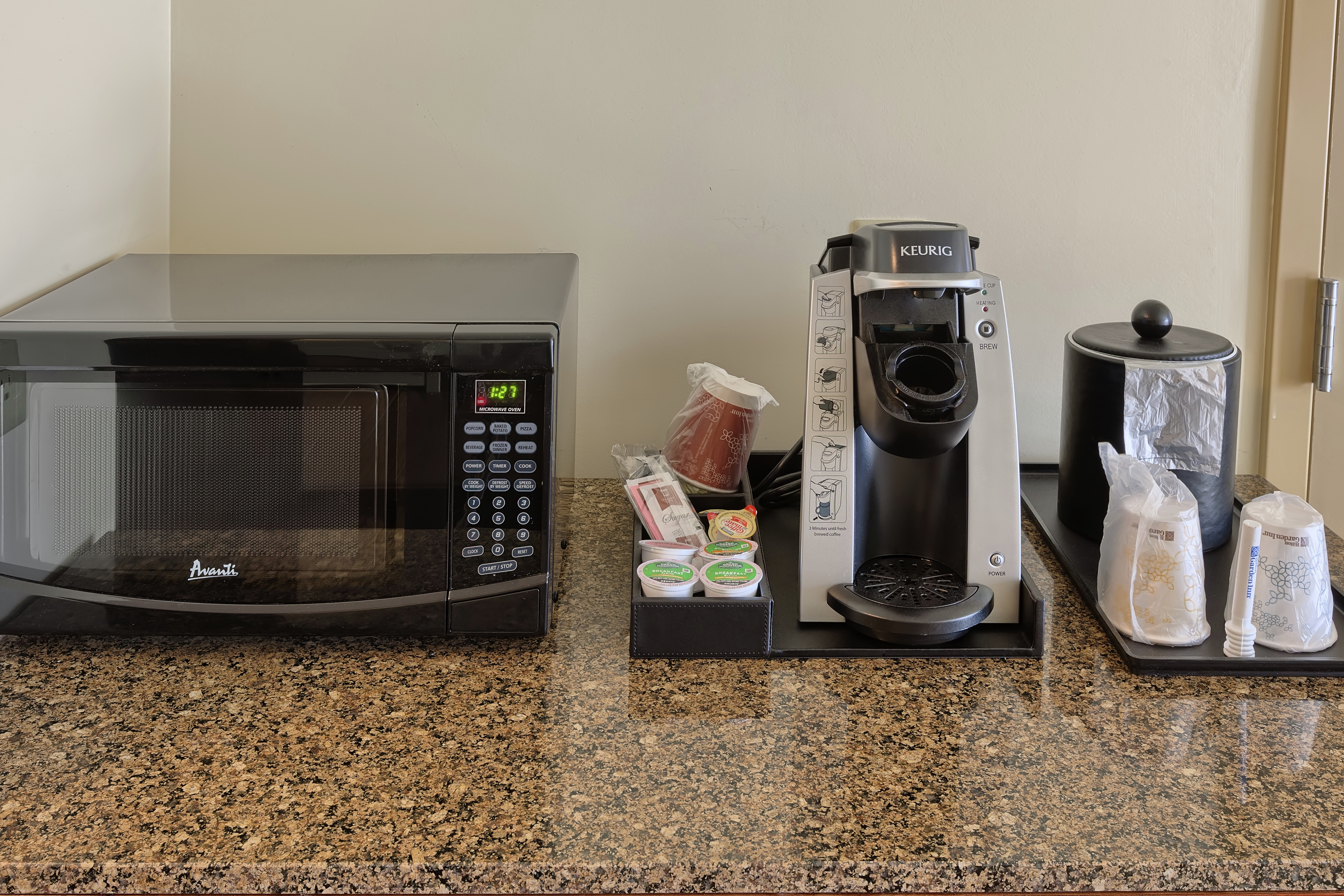 Close-Up of Microwave and Coffee Machine in Guestroom