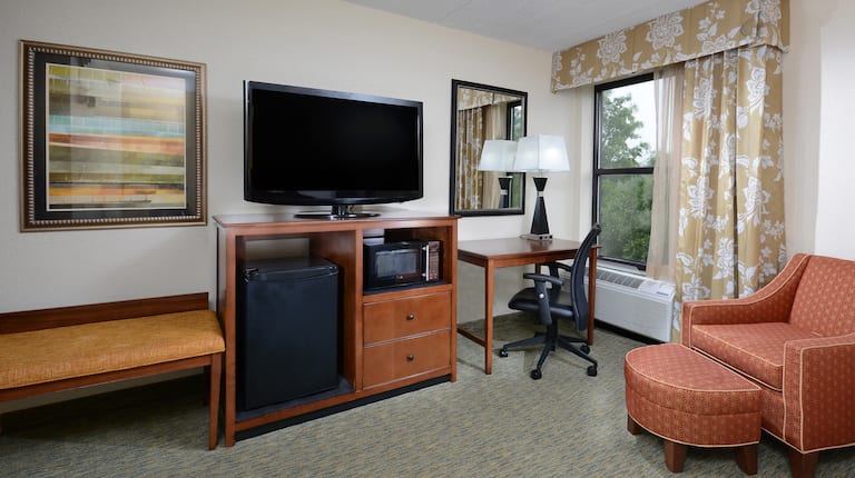 Hotel Room with Microfridge Desk HDTV and Armchair