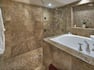 Presidential Suite Bathroom with Walk In Shower and Tub