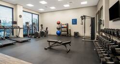 Fitness Center with Weights Treadmills and Elliptical Machines