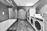 гостиничная прачечная, стиральные и сушильные машины