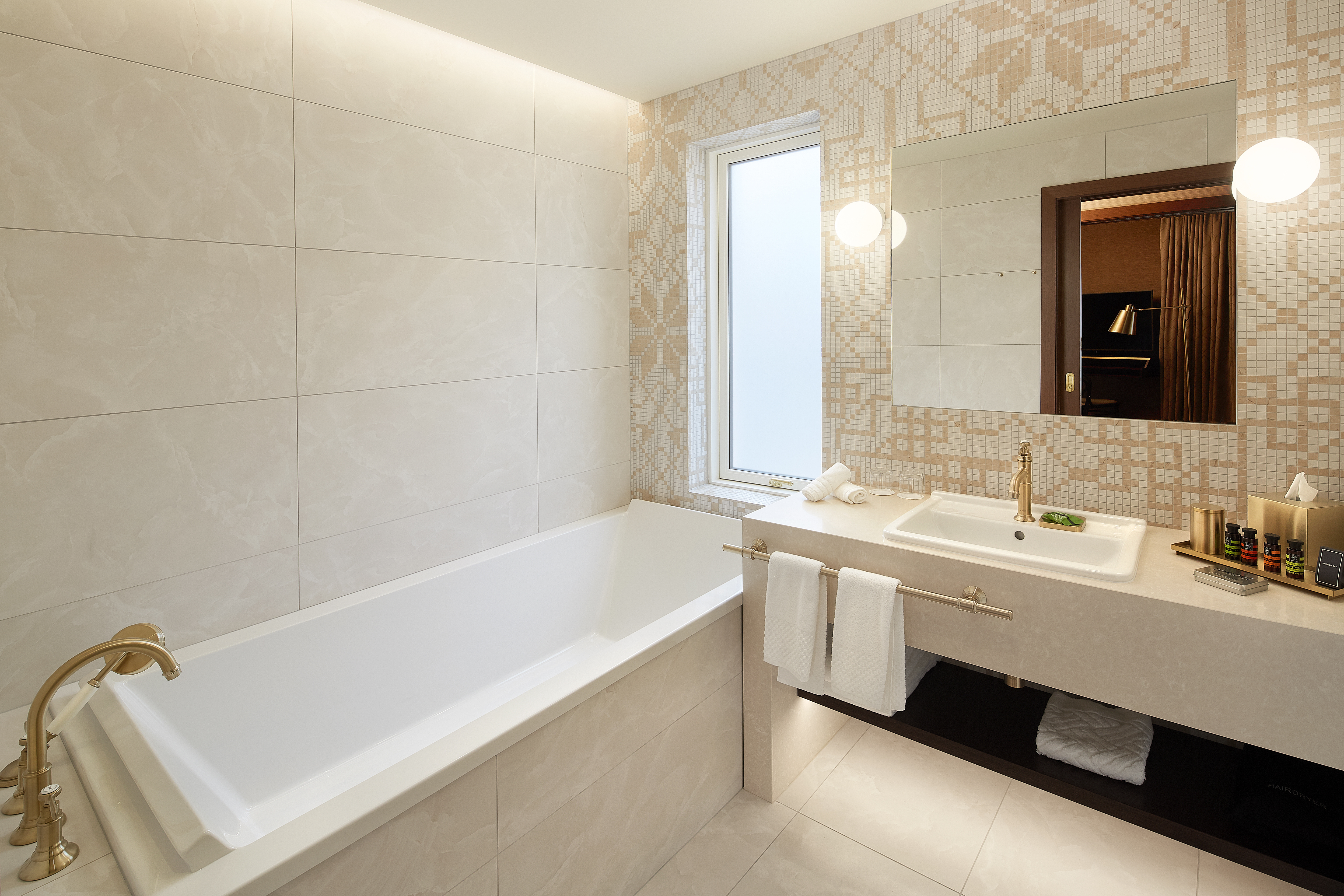 Suite Bedroom with Vanity, Mirror and Tub