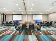 Water Tower Meeting Room with Conference Tables and Projector Screens