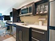 Suite Kitchen Area with Microwave Dish Washer and Full Size Fridge