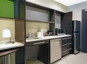 Accessible Suite Kitchen with Microwave Sink Dishwasher and Full Size Fridge