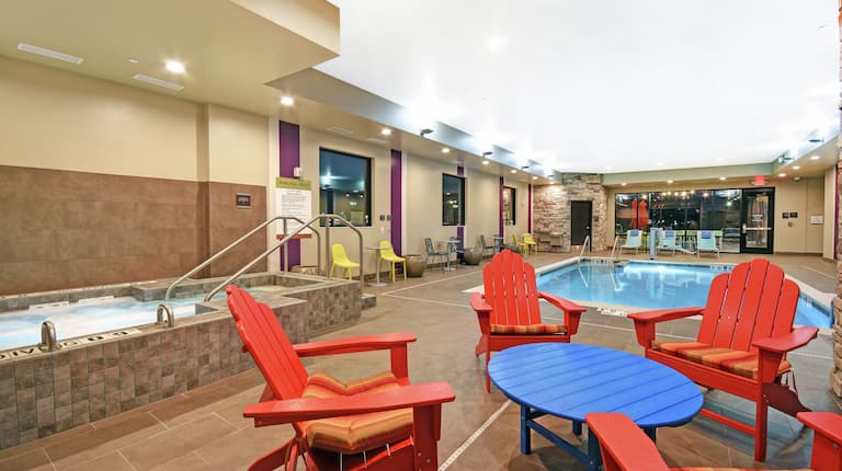 Indoor Pool and Hot Tub with Seating Area