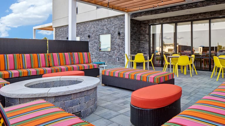 exterior patio with fire pit in the day