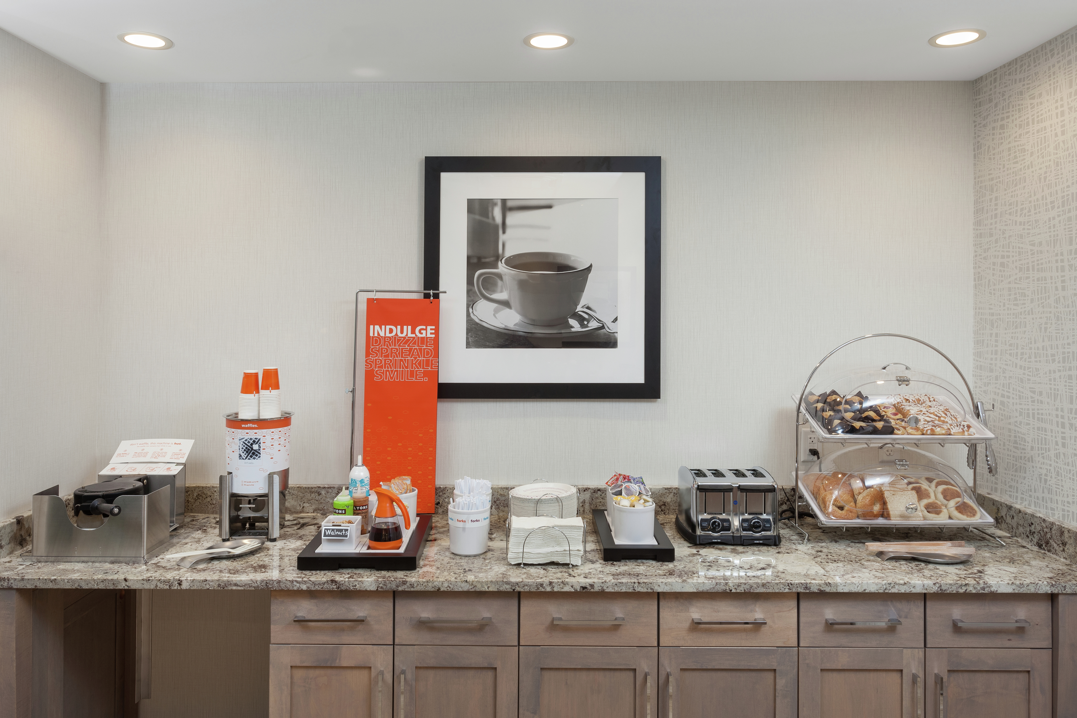 Breakfast Buffet Area with Coffee and Pastries