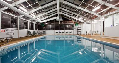 Indoor pool reflecting angled ceiling