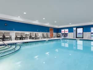 indoor pool, lounge chairs