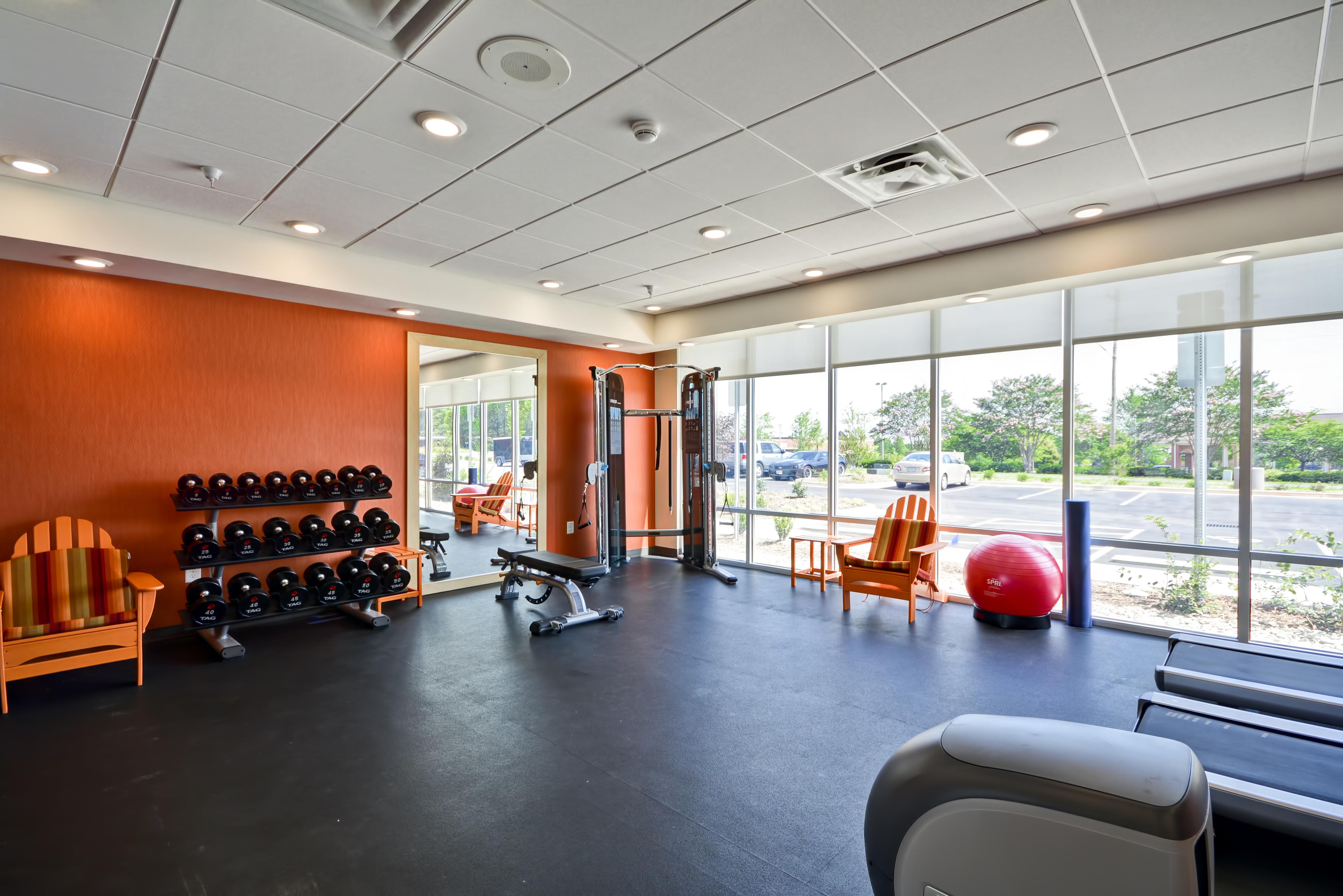Fitness Center with Dumbbell Rack, Weight Bench, Weight Machine, Treadmills and Cross-Trainer