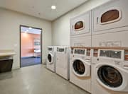 Guest Laundry Room with Coin-Operated Washing Machines