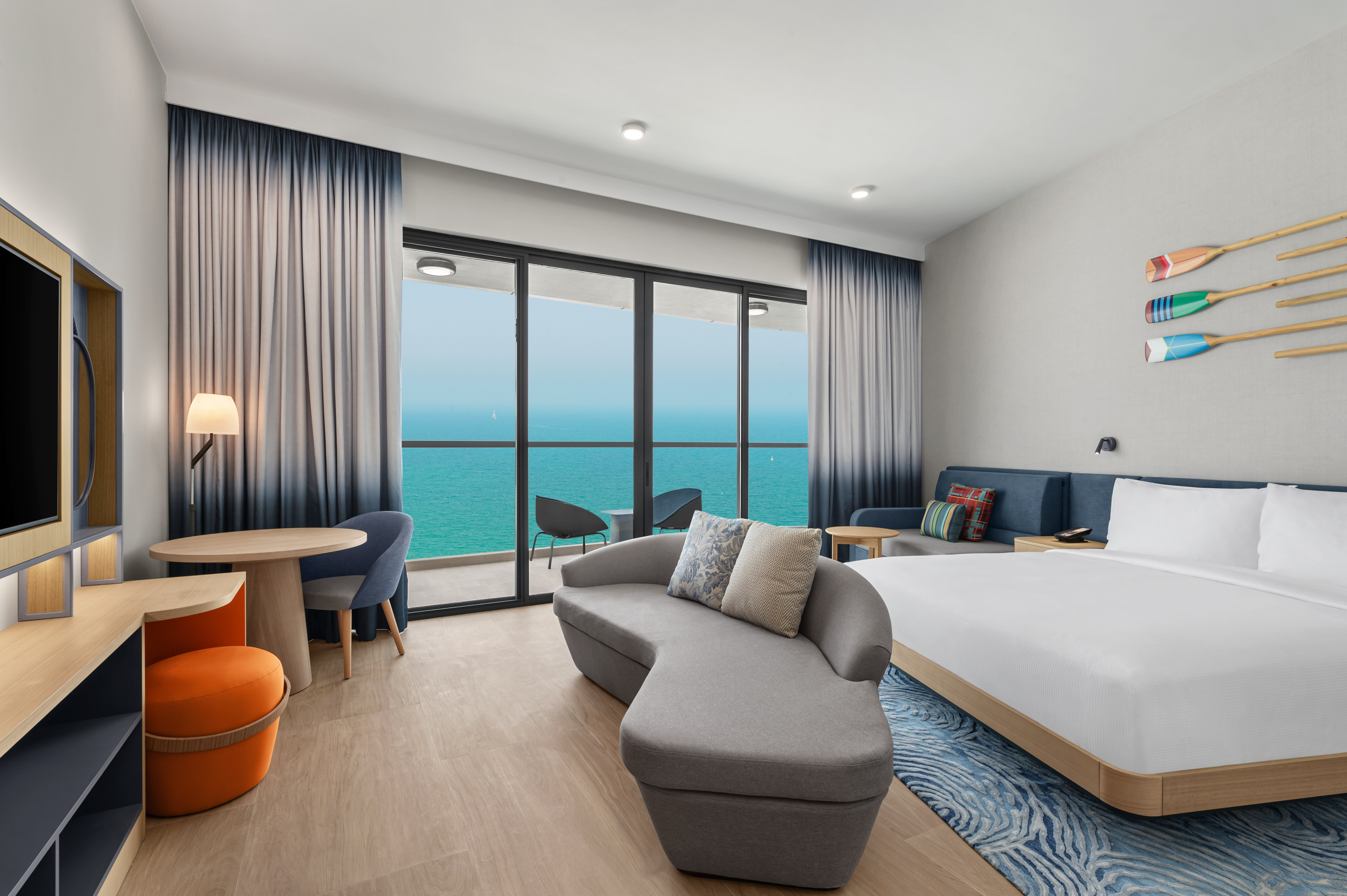 Family Guest Room with Sofa HDTV and Sea View