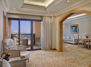 Suite Living Area and Balcony with View of the Gulf