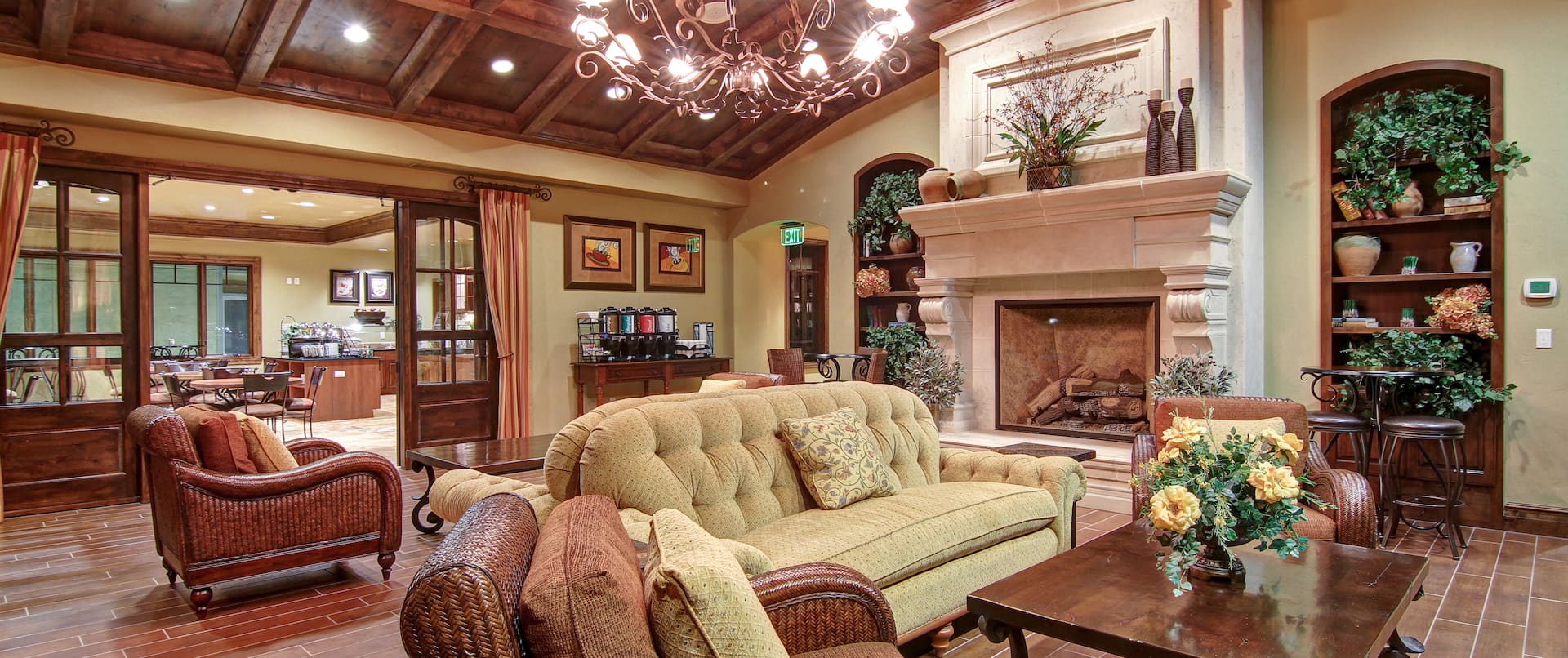 The Great Room lobby with ample seating and fireplace