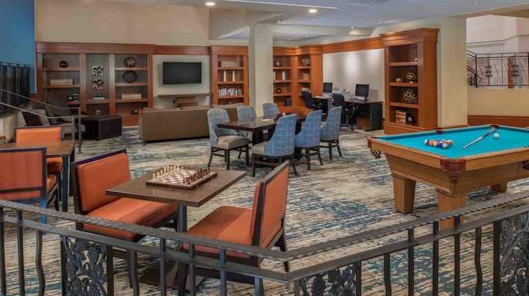 lobby library, pool table, chess game, tv, business center computers