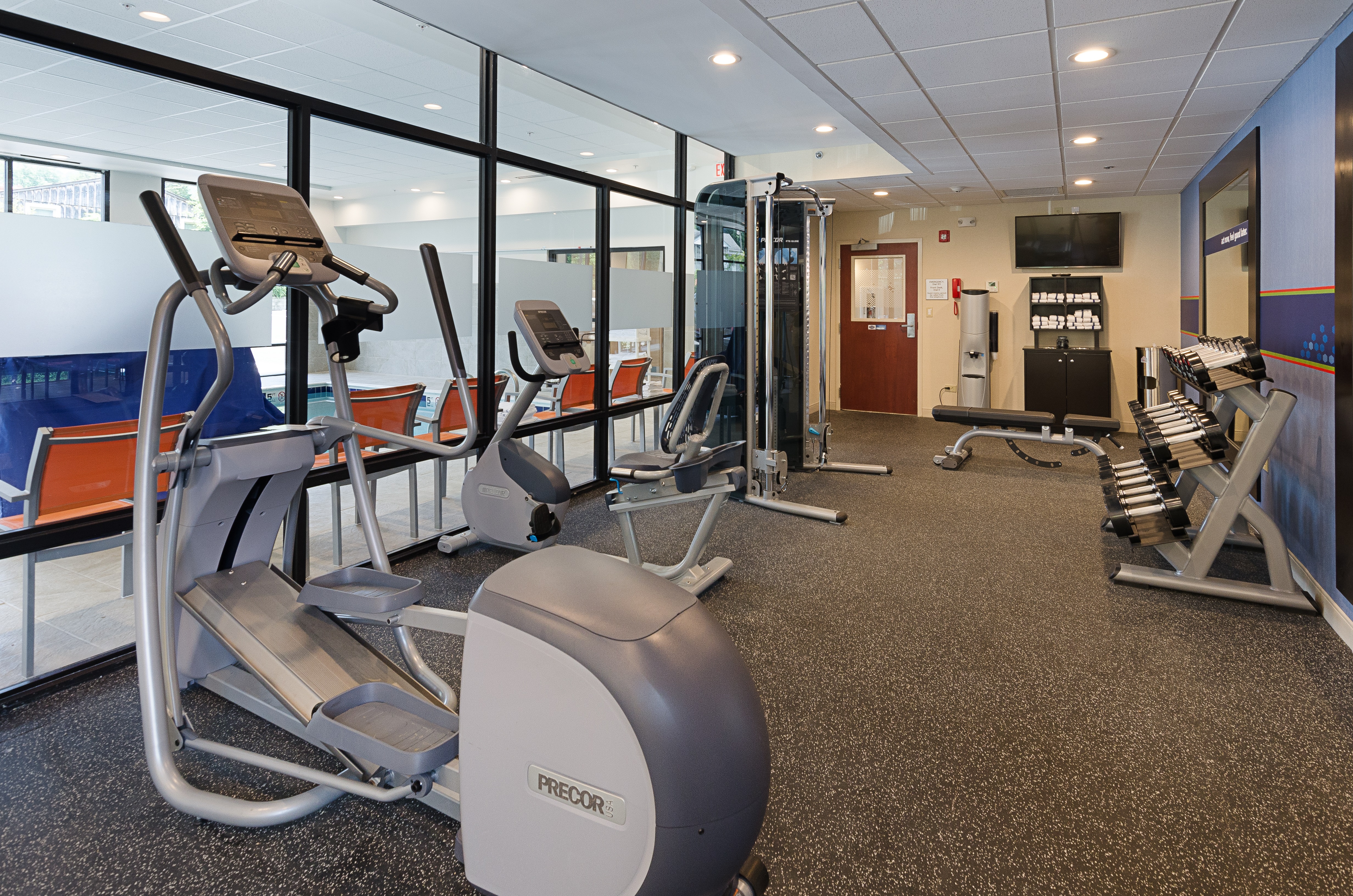Fitness Center with Cross-Trainer, Cycle Machine, Weight Machine, Weight Bench and Dumbbell Rack