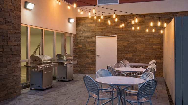 Patio with Tables and BBQ Grills
