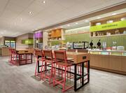 Spacious breakfast area featuring complimentary daily buffet fully stocked with delicious food and beverages.