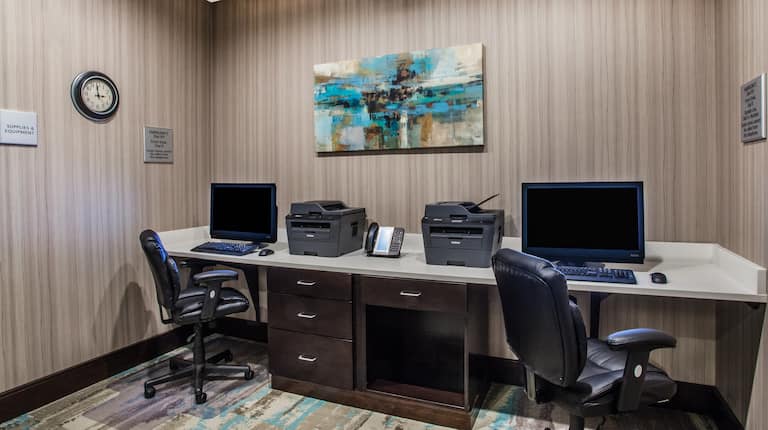 Business Center with Two Desktop Computers, Two Printers and Office Chairs