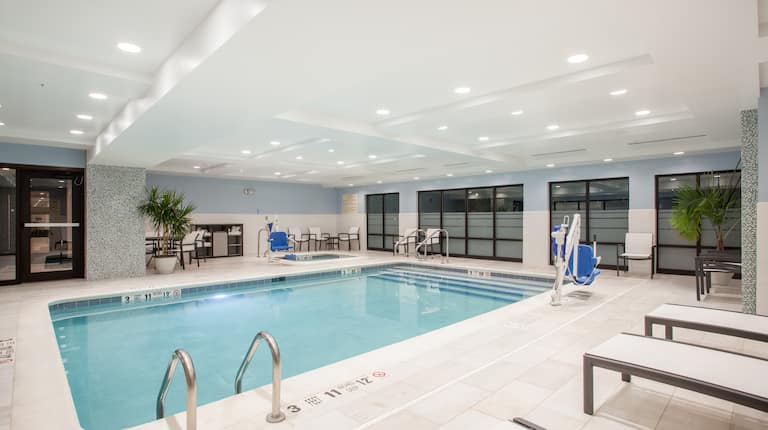 Indoor Swimming Pool with Deck Chairs