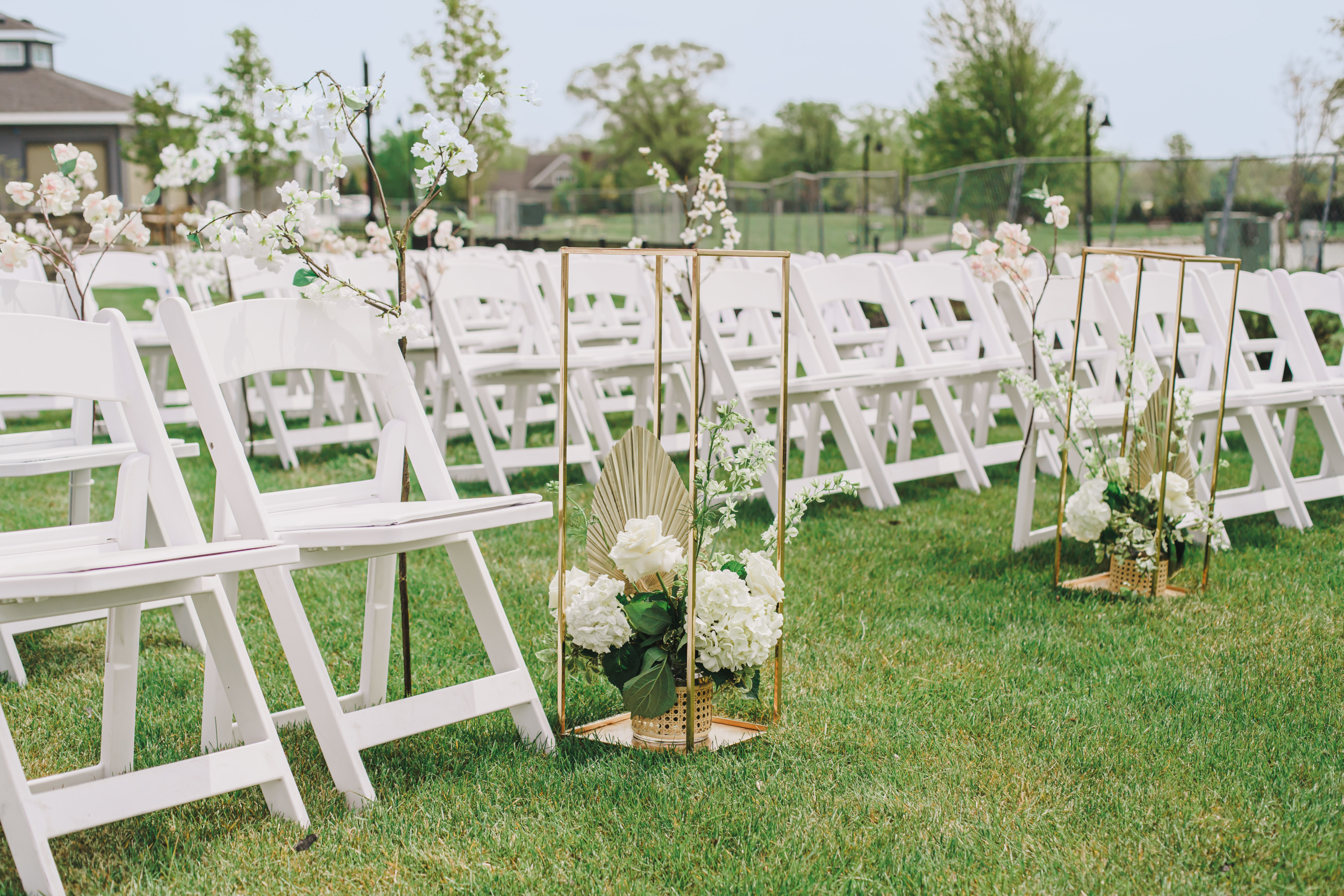 Outdoor wedding setup with chairs