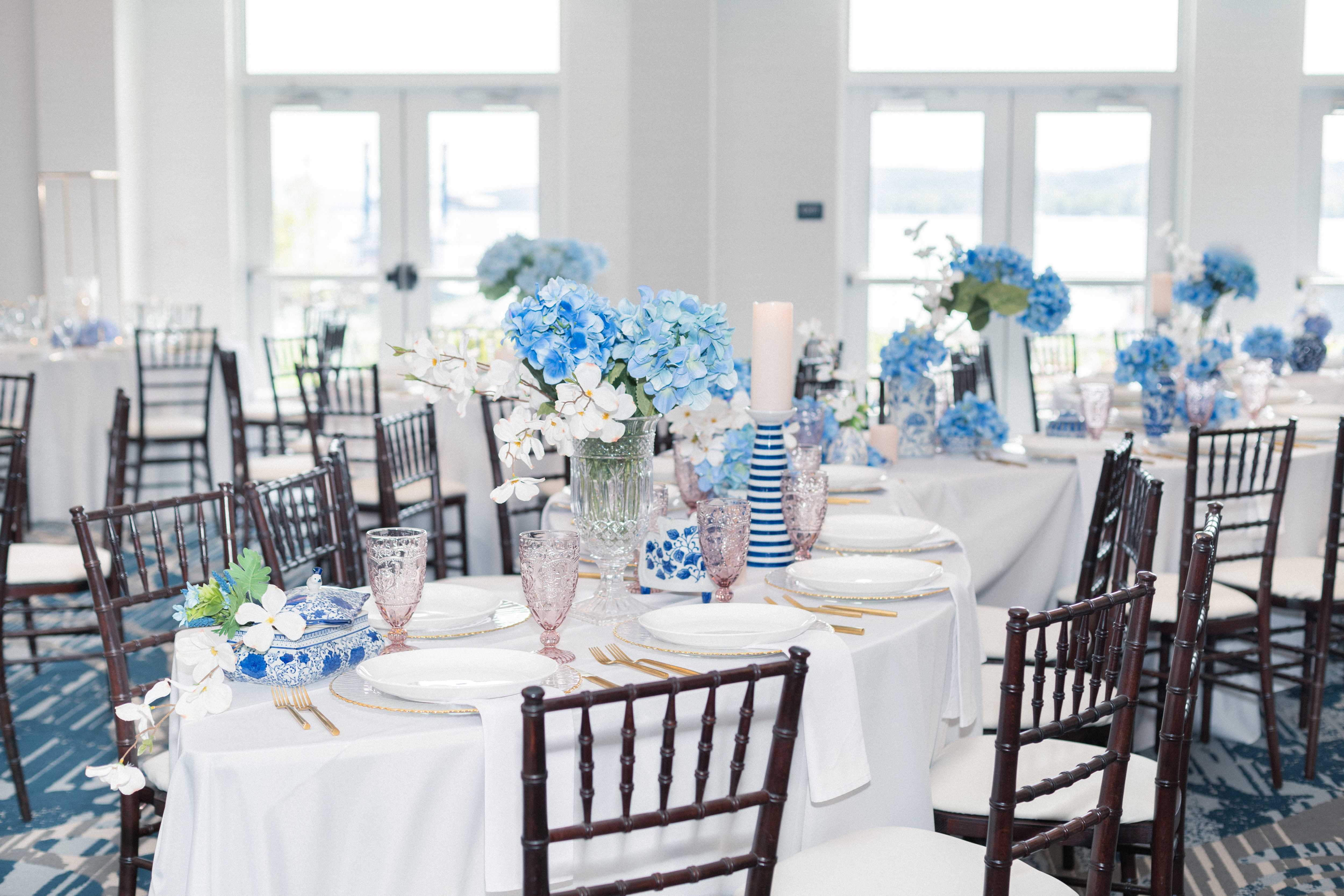 Wedding setup with tables, chairs and flowers