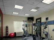 Fitness Center with Treadmill, Recumbent Bike, and Strength Equipment