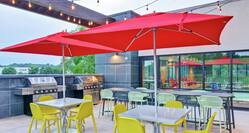Patio with Umbrella Tables and BBQ Grills