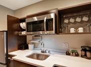 Suite Kitchen with Fridge, Microwave, Dishwasher and Sink