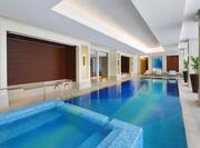 Indoor Pool with seating area