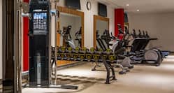 Fitness center weight machine, free weights and treadmills