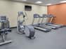 Fitness Center with Treadmills, Cross-Trainer, Cycle Machine and Wall Mounted HDTV