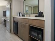 Wet Bar Area with Minifridge Microwave and Coffeemaker