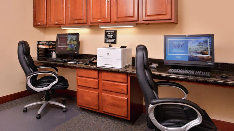Business Center with Two Computers, Desks, and a Printer