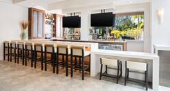 Mosaic Bar with Counter Seating and Televisions