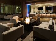 Bar with Outdoor Patio Seating Area and Fireplace