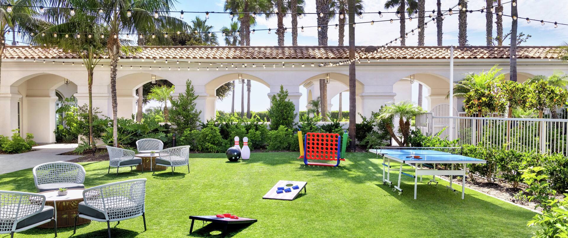 Spacious outdoor patio area for guests to relax and play fun lawn games.